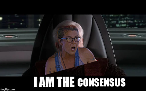 This meme features a screenshot from the TV show "The Office" where the character Dwight Schrute is being interviewed. The image is captioned with the text "I am the one who knocks" but has been altered to read "I am the consensus". The meme is a humorous take on the original quote, implying that Dwight is the consensus of something, but the exact context is unclear.